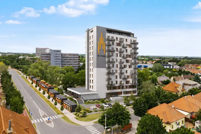 Vizualizácia: letecký pohľad na SkyTower a rad prevádzok obchodnej pasáže pozdĺž ulice